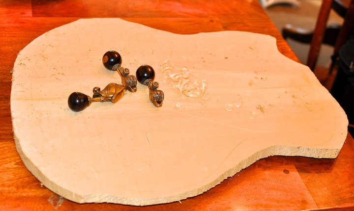 Chris Laarman finger planes on rough archtop top.